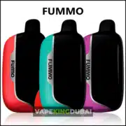 Three FUMMO Power 15000 Puffs disposable vapes displayed in red, teal, and purple with sleek designs, black mouthpieces, and silver vertical branding. The background includes the text "VAPEKINGDUBAI" at the bottom.